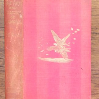 book with red cover - The Art and Practice of Hawking by E.B. Michell