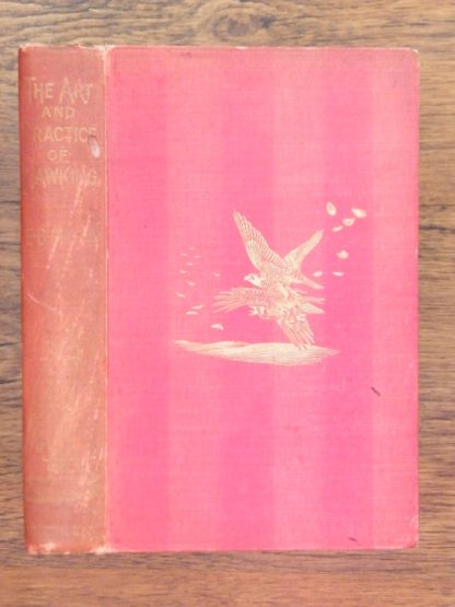 book with red cover - The Art and Practice of Hawking by E.B. Michell